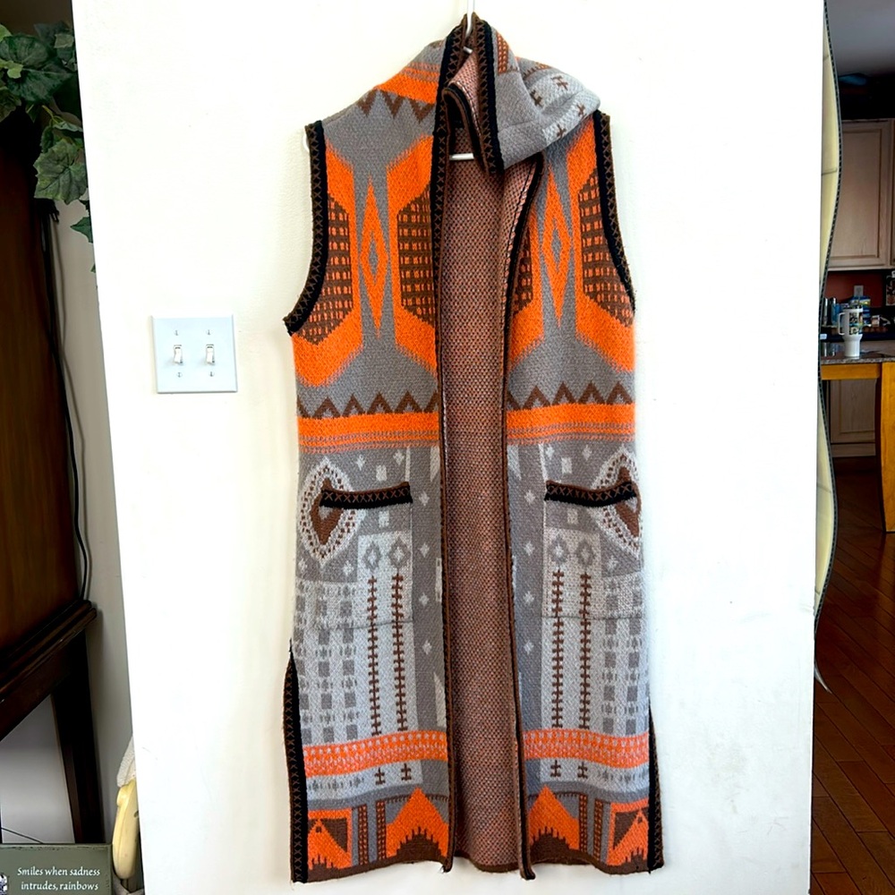 Coco and Carmen long sweater vest with hood